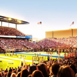 description: a packed stadium filled with cheering fans, colorful banners, and a vibrant halftime show.