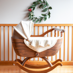 a beautiful wooden bassinet with a curved design and a soft plush lining. the bassinet is set against a neutral-colored wall and is surrounded by a few baby toys and a small potted plant.